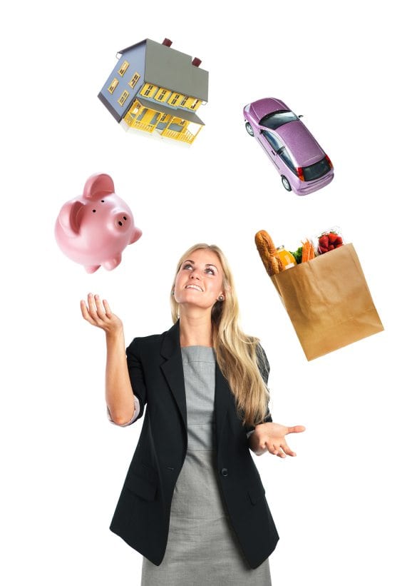 Woman juggling piggy bank, house, car, and groceries.